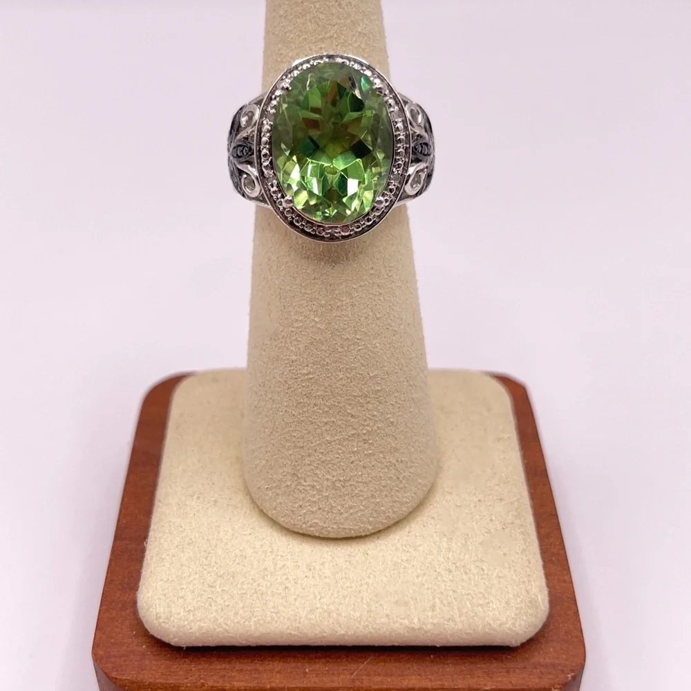 Simulated peridot in sterling silver with black rhinestone accents
